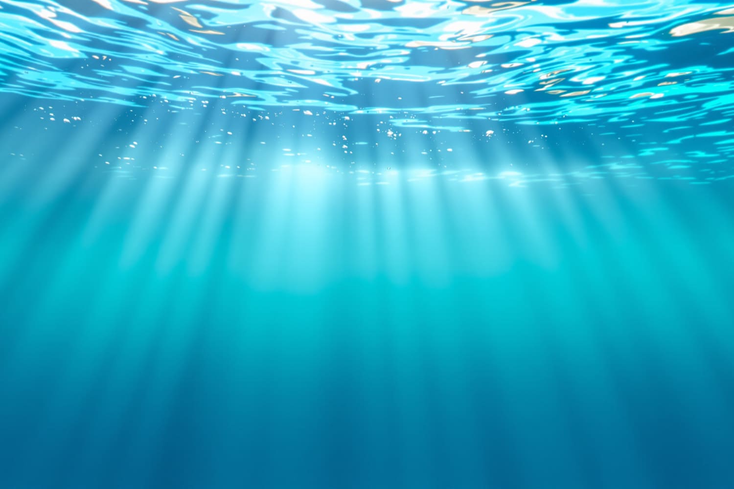 Lichtstrahlen im klaren blauen Wasser